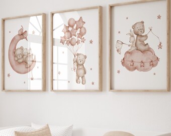 May include: Three framed watercolour prints with teddy bears. One shows a bear on a crescent moon, another with star-shaped balloons, and the last on a cloud with a bunny. The prints have a soft, neutral colour palette, ideal for a nursery or child's room.