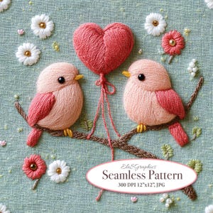 May include: Embroidered design featuring two pink birds holding a red heart balloon. The birds are stitched with pink thread and the heart is stitched with red thread. The background is a light blue fabric with white flowers and green leaves.