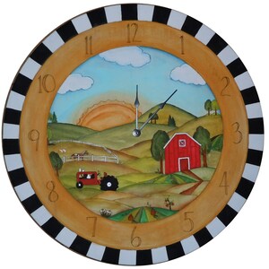 May include: A round wooden clock with a black and white striped frame. The clock face features a painted scene of a farm with a red barn, a tractor, and a sunrise. The numbers 1 through 12 are painted around the edge of the clock face.