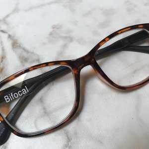 Classic BIFOCAL Readers Clear Lens Tortoise & Matte Black Frame Size in Item Details