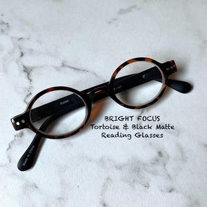 BRIGHT FOCUS Tortoise Front Frame with Black Matte Temples Small Oval Reading Glasses Frame and Lens Size in Item Details