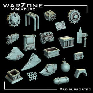 May include: A collection of light gray miniature war game terrain pieces, including a gear, a bomb, a crate, and other industrial-themed components. The text "WARZONE MINIATURE" is at the top, and "PRE-SUPPORTED" is at the bottom.