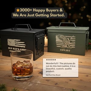 May include: A black metal ammunition box with a distressed American flag and the text OLD MAN'S AMMO, and an olive green metal ammunition box with an eagle and American flag graphic and the text COWART, alongside a glass of amber liquid with ice.