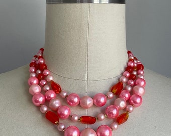 Vintage 1960’s Pink Faux Pearl and Orange Lucite Bead Triple Strand Necklace
