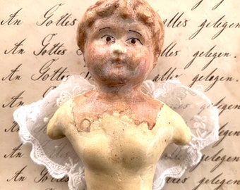 Buste de tête de poupée en plâtre fait main