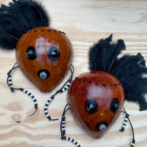 The First Twins - Gourd Mask Wall Hanging