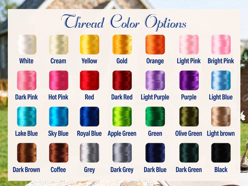 May include: A color chart titled Thread Color Options displaying twenty-eight individual spools of embroidery thread in various shades including white, cream, yellow, gold, orange, pinks, reds, purples, blues, greens, browns, grey, and black.
