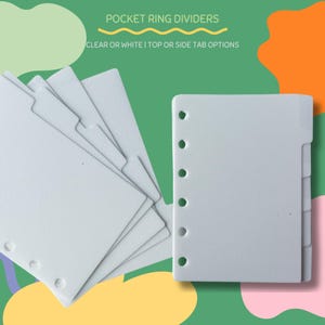 May include: White pocket ring dividers with top or side tab options. The dividers have pre-punched holes for ring binders. Text on the image reads "POCKET RING DIVIDERS" and "CLEAR OR WHITE | TOP OR SIDE TAB OPTIONS".