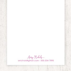 May include: A white card with a pink handwritten signature that reads "Avery Nichols" and contact information: "anichols@gmail.com  555-234-7890".