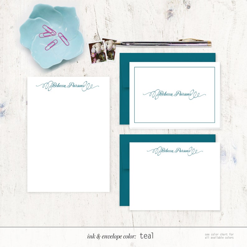 May include: Teal stationery set with a personalized script font that says "Rebecca Parsons" on the front of the card and envelope. The ink and envelope color is teal.