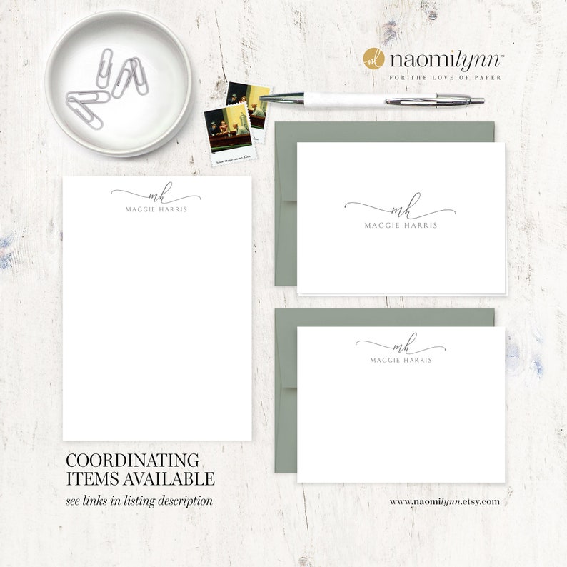 May include: A set of three white stationery note cards with a gray envelope. The note cards feature a simple script font with the name "Maggie Harris" and the initials "mh".
