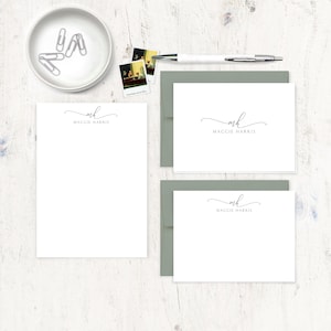 May include: Three white stationery note cards with a gray envelope. The note cards have a simple script font with the initials "mh" and the name "Maggie Harris" printed on each card.