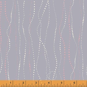 May include: A gray fabric with a repeating pattern of white and pink dots arranged in wavy lines. The fabric is measured with a ruler in inches.