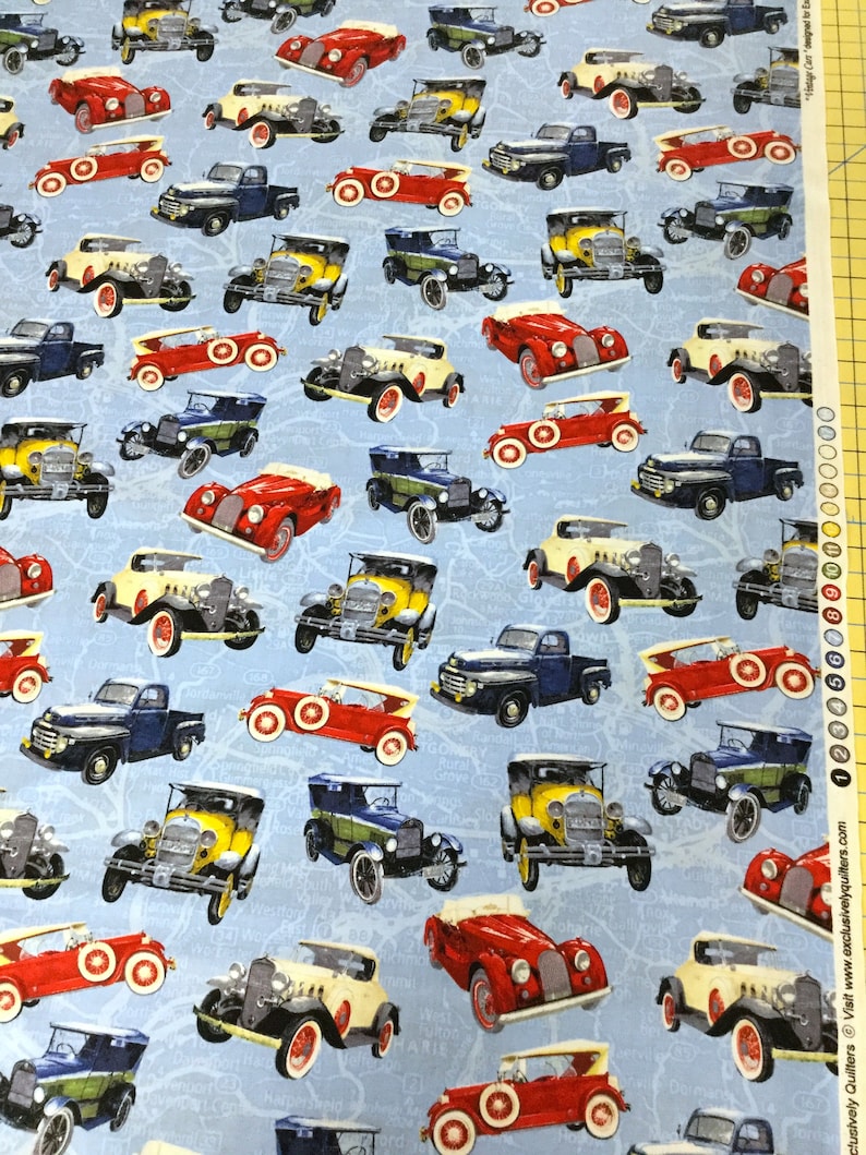 Fabric Exclusively Quilters Antique Cars tossed on a blue map background 20s 30s vintage cars