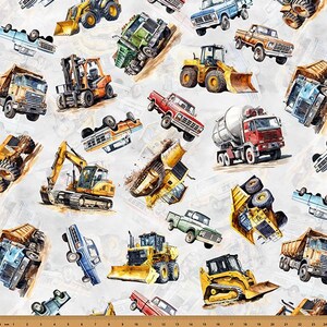 May include: A white fabric with a repeating pattern of construction vehicles and trucks in various colors. The design includes dump trucks, excavators, bulldozers, and cement mixers, creating a playful and dynamic composition.