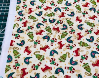Fabric QT Happiness is Homemade Christmas Sewing Quilting theme Stitched Ornaments Dala Horses Trees Candy Canes tossed on cream