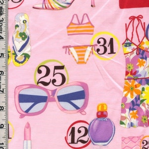 May include: Pink fabric with a variety of colorful images, including sunglasses, a pair of flip flops, a bikini, a dress, a high heel shoe, a bottle of perfume, lipstick, and a watch. The numbers 5, 12, 13, 18, 25, 31 are visible on the fabric.
