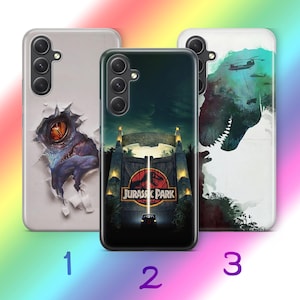 May include: Three different phone cases featuring Jurassic Park designs. The first case is white with a ripped hole revealing a dinosaur head. The second case is black with a Jurassic Park logo and a gate. The third case is white with a silhouette of a dinosaur and a helicopter.