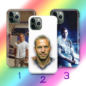 May include: Three different phone cases featuring a portrait of Paul Walker. The first case has a photo of Walker in a white shirt standing next to a blue and white car. The second case has a close-up portrait of Walker. The third case has a photo of Walker in a blue shirt with a blue and white background.