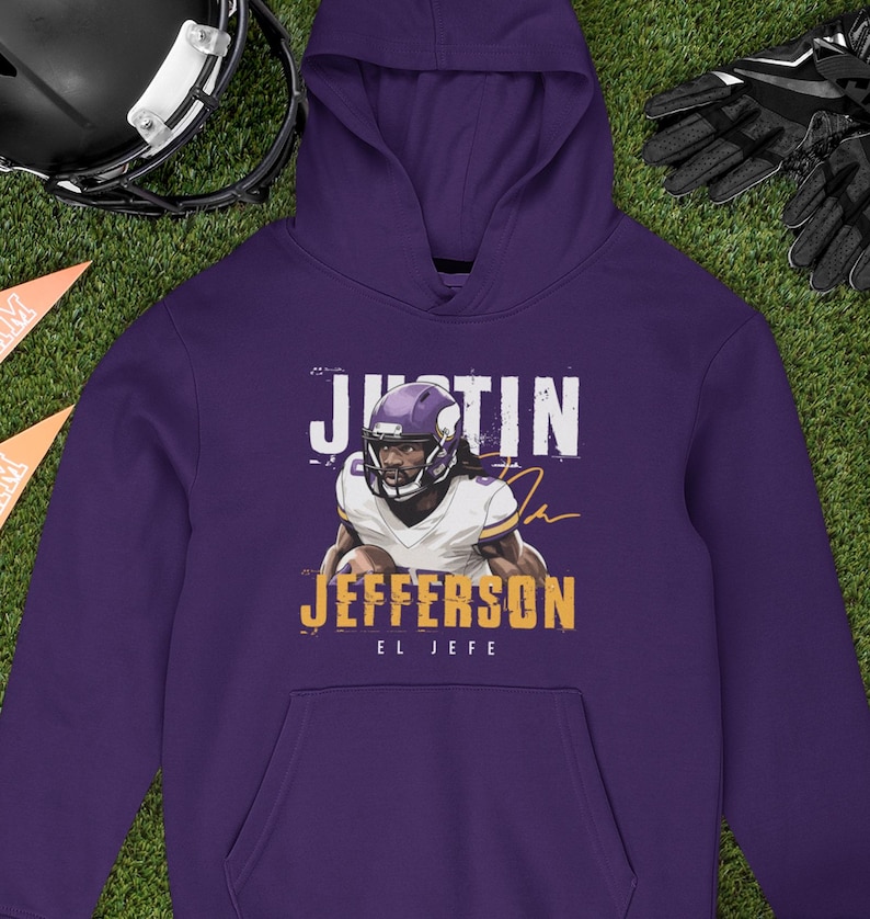 a purple hoodie with a picture of a football player on it