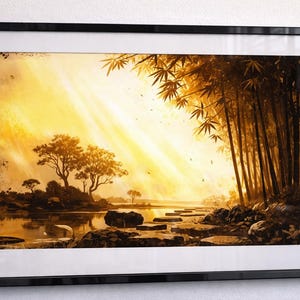 May include: Framed landscape art print featuring a serene scene with a river, trees, and bamboo. The artwork is dominated by warm yellow and brown tones, with sunlight streaming through the trees. The print is encased in a black frame.