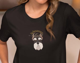May include: Black t-shirt featuring a Schnauzer Mom design. The design includes the text "Schnauzer Mom" above a cartoon illustration of a Schnauzer dog's face. The dog's face is black, white, and gray.