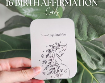 May include: A white card with black text and a line drawing of a pregnant woman with flowers in her hair. The text on the card reads "I trust my intuition".