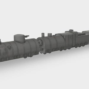 May include: A gray model train with multiple cars, including a locomotive and several boxcars. The train has a detailed design with visible rivets and other features. The train appears to be a military or armored train.
