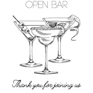 May include: Open bar sign with a hand-drawn illustration of three martini glasses with olives and a lime wedge. The text reads "Open Bar" and "Thank you for joining us CHEERS!"