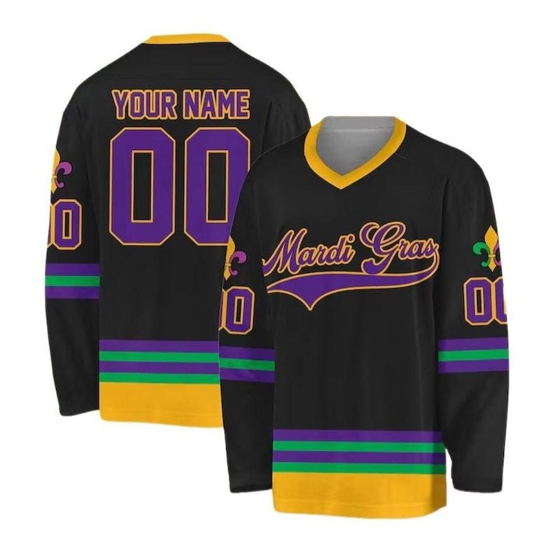 May include: Black hockey jersey with gold, purple, and green accents. The front features the text "Mardi Gras" in purple script. The back has the text "YOUR NAME" above the number "00" in purple.