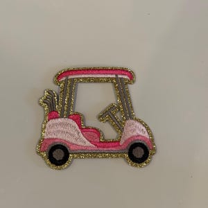 Carrinho de golfe rosa pequeno remendo de ferro