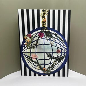 Tarjeta con bola de discoteca floral