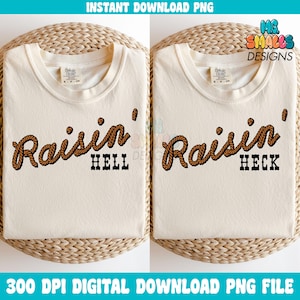 Op de afbeelding: Twee beige t-shirts met de tekst "Raisin' Hell" en "Raisin' Heck" in bruine touwlettering.