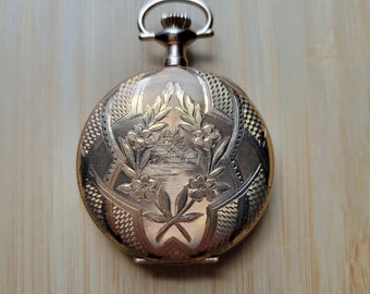 Antique Edwardian ornate gold filled ladies Elgin pocket watch, pendant watch, lapel watch