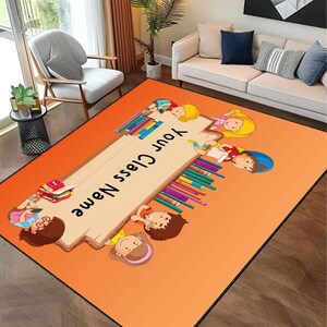 May include: Orange rug with a wooden sign that says "Your Class Name". The sign is surrounded by cartoon children holding books and pencils.