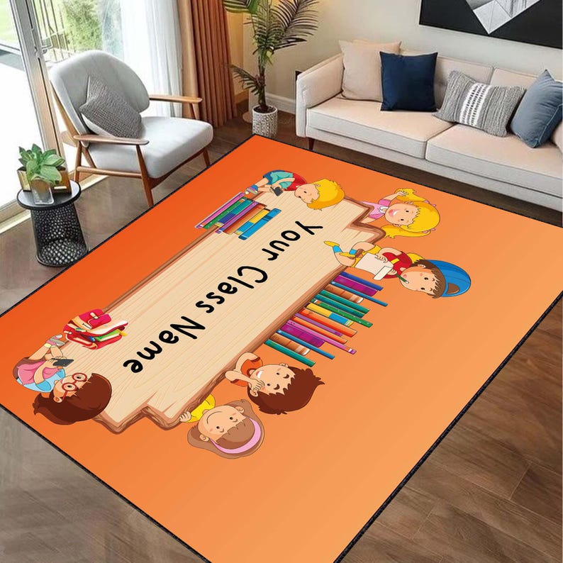 May include: Orange rug with a wooden sign that says "Your Class Name". The sign is surrounded by cartoon children holding books and pencils.