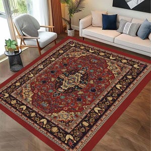 May include: A large, rectangular rug with a traditional Persian design. The rug features a deep red field with an intricate floral and geometric pattern in gold, blue, and black. The border is a darker burgundy with repeating floral motifs.