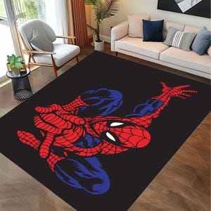 May include: Black area rug with a red and blue cartoon image of Spiderman in a web-slinging pose.