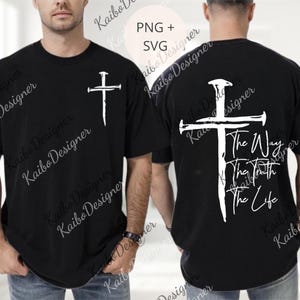 May include: Black t-shirt with a white cross graphic on the front and back. The back of the shirt features the text "The Way, The Truth, The Life" in a handwritten style. The shirt is a comfortable, casual style.