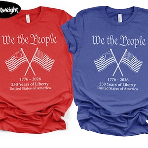 May include: Two t-shirts, one red and one blue, each with the text "We the People" above crossed American flags. Below the flags is "1776-2026 250 Years of Liberty United States of America."