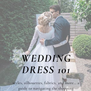 May include: A couple pose for a wedding photograph. The bride is wearing a white wedding dress with long sleeves and a flowing skirt. The groom is wearing a dark suit and a white shirt. The text "WEDDING DRESS 101" is superimposed on the image. The text below reads "styles, silhouettes, fabrics, and more... a guide to navigating the shopping experience."