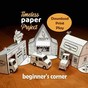 May include: A set of three paper craft buildings including Tom's Garage, Jenny's Ice Cream Bar, and McMillen's farm, accompanied by a paper ice cream truck and a tractor. The text reads Timeless paper Project, Download Print Play, and beginner's corner.
