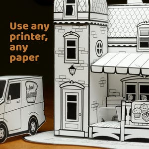 May include: A black and white paper craft model of a bakery building and a delivery van. The building features a tall tower, a striped awning, and a storefront. The van displays the text Appala BAKERY. Text reads: Use any printer, any paper.