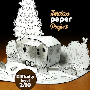 Peut inclure: Une scène artisanale en papier noir et blanc représentant une caravane vintage ornée de motifs floraux, entourée d'arbres et de buissons. Le texte "Timeless paper Project" et "Difficulty level 2/10" sont également visibles.
