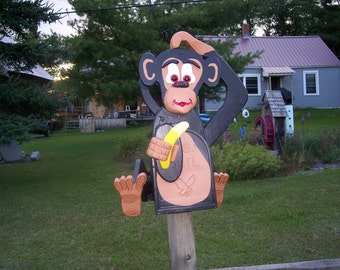 monkey mailbox, custom animal mailbox, monkey holding a banana and scratching his head custom mail box