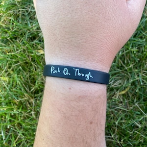 Tyler Joseph’s handwriting “Push On Through” x “Stay Alive” silicone bracelet (one bracelet with two sayings) ink injected to last!!