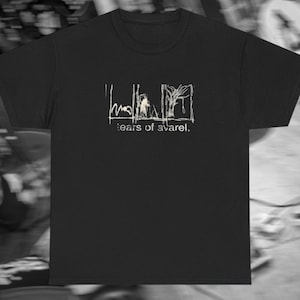 May include: Black t-shirt with a white graphic of a stick figure with a tree and the text "tears of a vavel."