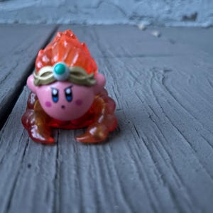 Conjunto de 4 figuras de Kirby Elemental: Minicoleccionables sólidos y pesados: Fuego, Agua, Hielo y Cupido Arquero - Nintendo Display Toys