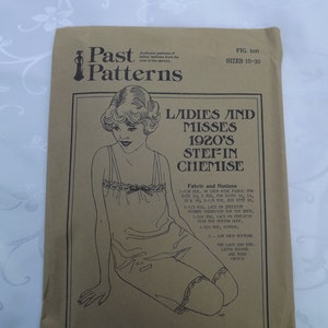 May include: A vintage sewing pattern for a ladies' and misses' 1920s step-in chemise. The pattern is printed on brown paper and features a line drawing of a woman wearing the garment. The pattern includes instructions for fabric and notions needed to make the garment. The text on the pattern reads "Ladies and Misses 1920's Step-in Chemise" and "Fig. 500 Sizes 10-20".