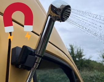 Magnetic adjustable shower holder